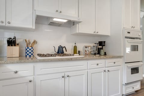 Coffee station beside stove area