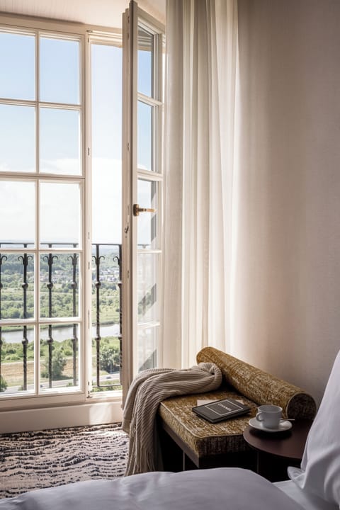 Premium View | Premium bedding, minibar, in-room safe, individually decorated