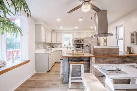 Kitchen (Wider view). Views to exterior. 
