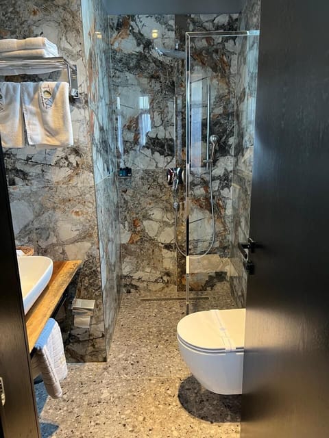 Family Suite, Balcony | Bathroom | Hair dryer, slippers, bidet, towels