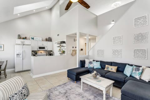 The loft above the stairs is the primary bedroom
