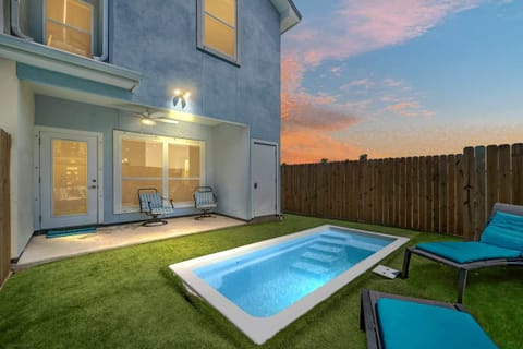 Cool off in your private heated pool as the sky turns gold