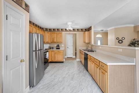 Our kitchen is not just a cooking space; it's a clean and thoughtfully designed haven equipped with kitchen essentials and utensils.