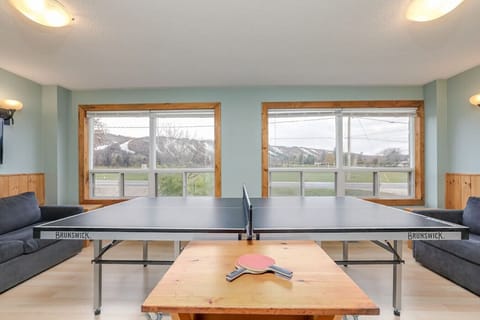 Ping Pong Table located on main floor with 2 pull out couches for your entertainment.  This room faces the road and has a breathtaking view of the mountain.