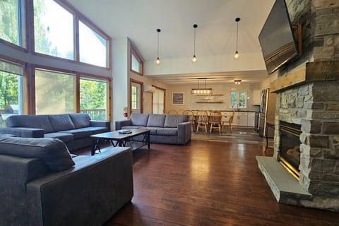 Photo taken from the end of the living room in the previous photo giving you a better scope of this main space.