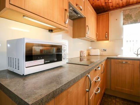 Fridge, electric kettle, toaster, cookware/dishes/utensils