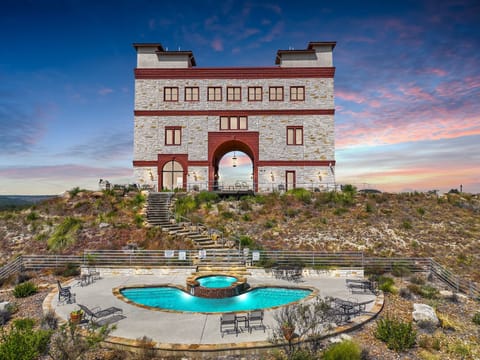 Embrace the hill country's beauty at our unique retreat under the twilight sky