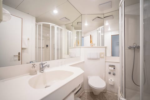 Shower, hair dryer, bathrobes, slippers