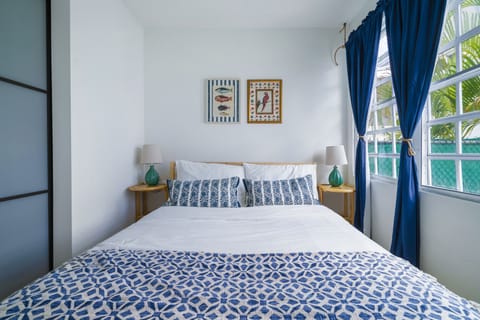 Enjoy this cozy queen bed with lots of natural light and black out curtains!