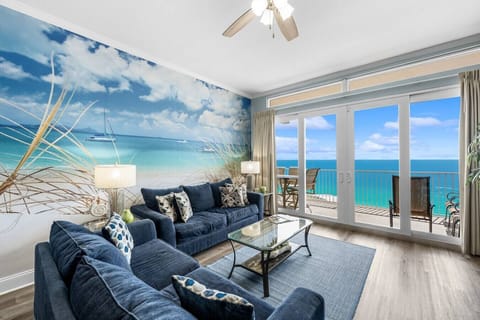 Bright, Open Living Area with Panoramic Ocean Views, Private Balcony Access, Custom Mural, Sleeper Sofa and Flat Screen TV