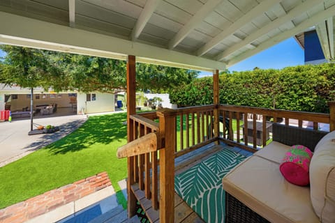 Backyard porch: cozy shaded spot to enjoy the fresh air.