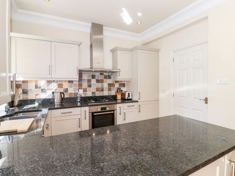 Fridge, dishwasher, electric kettle, toaster