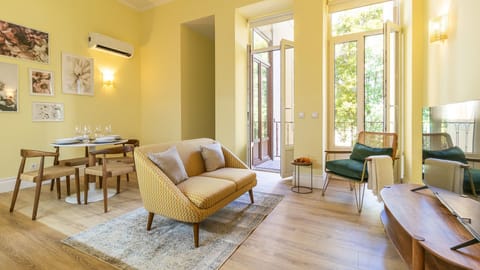 Unwind and make yourself at home in our inviting living room. Sink into the plush sofa and let the ambiance set the tone for a perfect retreat. Your cozy home away from home awaits!  #RelaxationStation