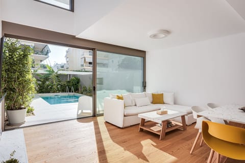 Signature Apartment | Living area | 50-inch Smart TV with digital channels, Netflix, streaming services