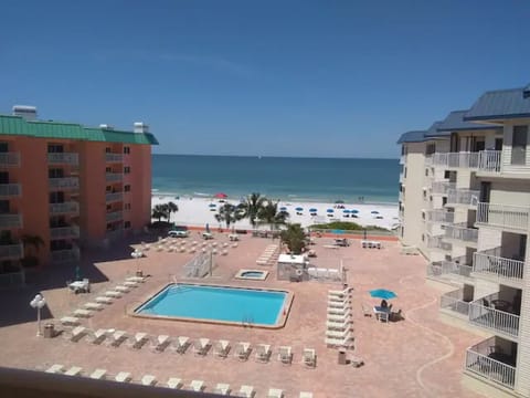 The spectacular Gulf Front and Living Room balcony view of the Pool Deck & Beach