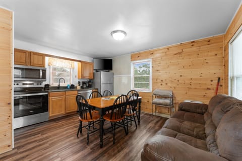 Where gourmet meals meet modern elegance   a kitchen and dining space designed for both cooking and sharing memories