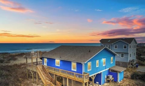 Change in Latitude: Aerial View Showing the Home’s Close Proximity to the Beach