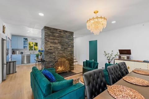 Cozy seating and dining around the fireplace.