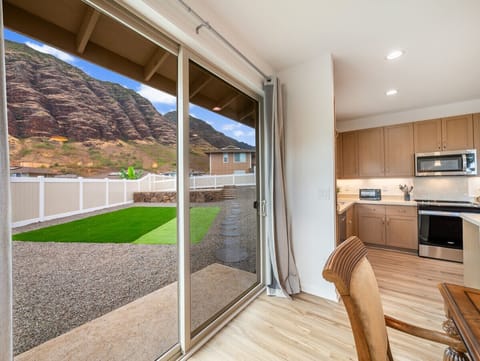 Peak into the beautiful backyard with putting green.