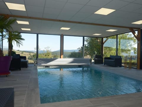 Indoor pool, pool umbrellas, sun loungers