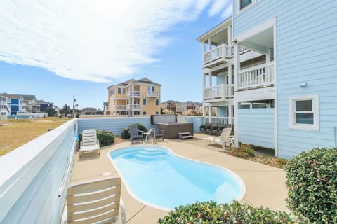 Lounge by the heated pool and hot tub.