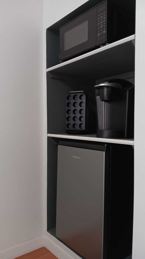Microwave,  Keurig coffee maker with Colombian  coffee and chocolate K-cup . 