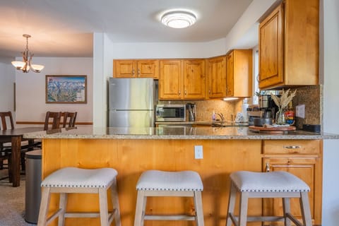 Seating for 3 at the kitchen island.
