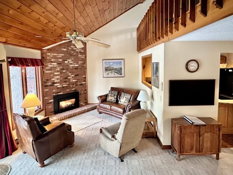 Cozy up next to the fire with a book and beautiful views. 
