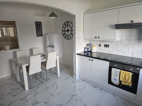 Apartment | Private kitchen | Full-size fridge, microwave, oven, stovetop