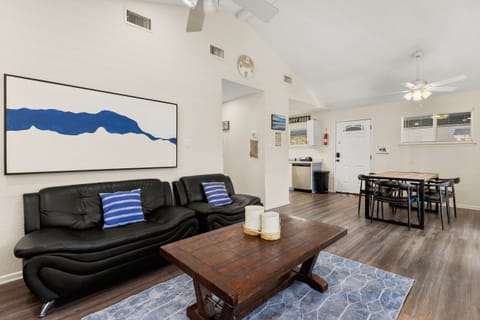 This open living space offers a relaxing setup for movie nights, family time, or cooling off after a day on the Guadalupe River.