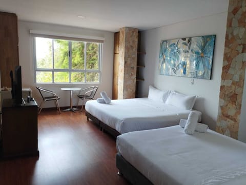 Deluxe Quadruple Room, Private Bathroom | Free WiFi