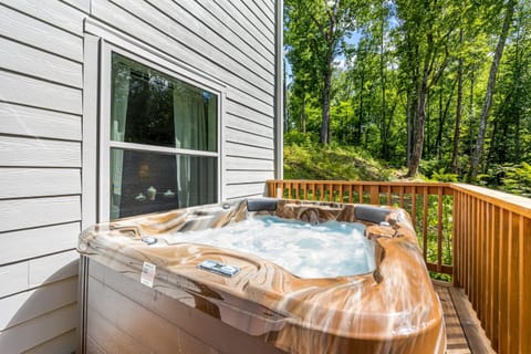 Soak under the stars! A private hot tub with mountain views is the perfect way to end the day. #HotTubViews #MountainEscape - The Loop - Gatlinburg, TN