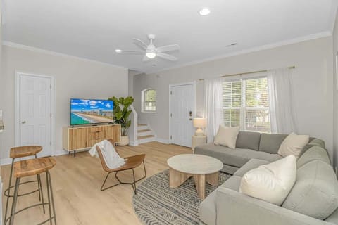 Bright and welcoming living space, perfect for relaxing after a day at the beach. Stream your favorite shows or enjoy game nights with the family! - The Myrtle - Myrtle Beach, SC