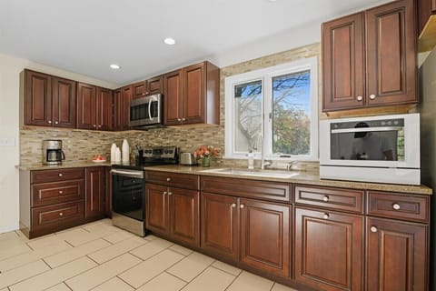 Fully stocked kitchen, complete with a countertop dishwasher for your ease and convenience while on family vacation! - The Coolbaugh - East Stroudsburg, PA