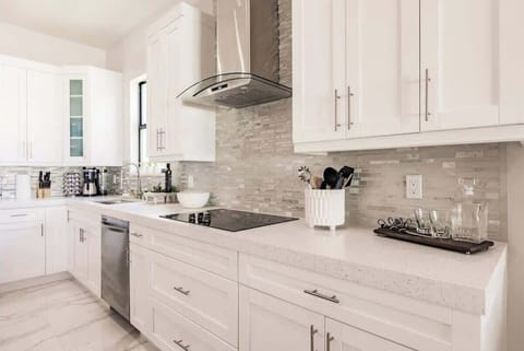 No one will feel cramped in the spacious kitchen! | Brisa del Mar by Boutiq Luxury Vacation Rentals | Naples, Florida