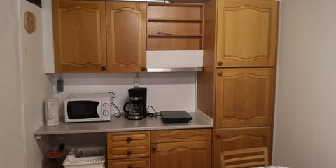 Standard Triple Room, 1 Bedroom | Private kitchenette | Coffee/tea maker, full-size fridge, microwave, stovetop