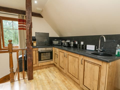 Fridge, electric kettle, toaster, cookware/dishes/utensils