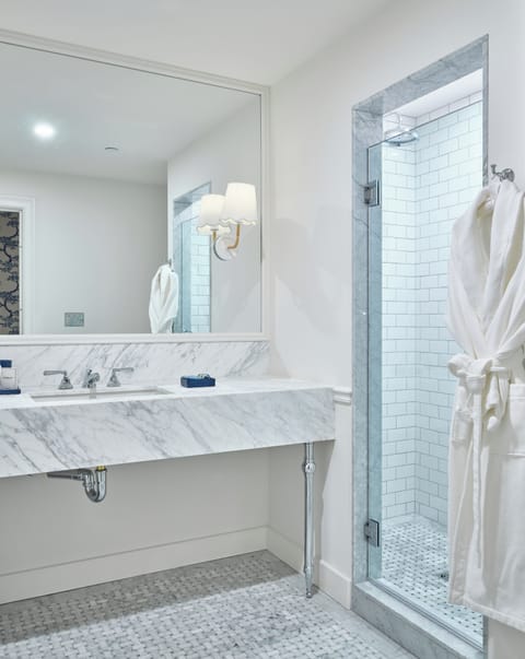 Designer toiletries, hair dryer, bathrobes, slippers