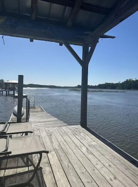 Dock and floater with kayak for use of guest