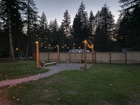 View of bonfire at dusk