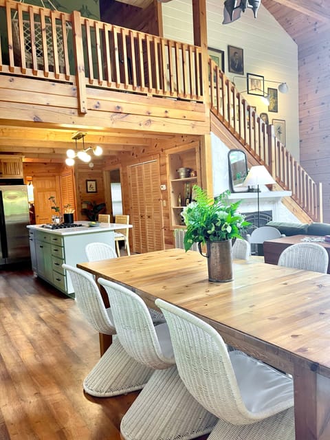 Enjoy meals at the large dining table accommodating up to ten guests.