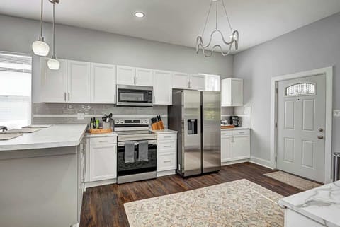 Our newly renovated kitchen is outfitted with sleek stainless steel appliances and fully stocked with plenty of cups, dishes, and a variety of pots and pans for cooking. A dedicated coffee station provides everything you need for your morning brew.