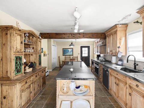 Connected to the kitchen is the dining area making it convenient to bring dishes straight from the oven to the table for a family style meal.