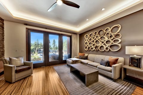 19 - Sectional sofa and hardwood floors in the living room.