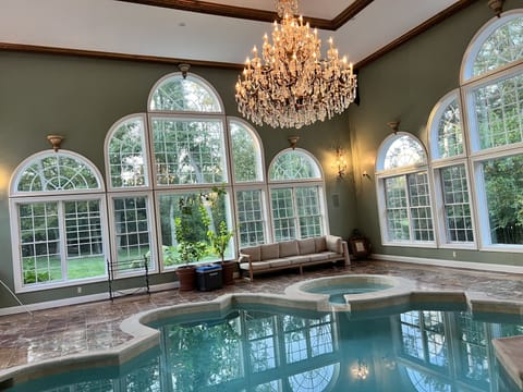View of indoor pool looking north out windows.