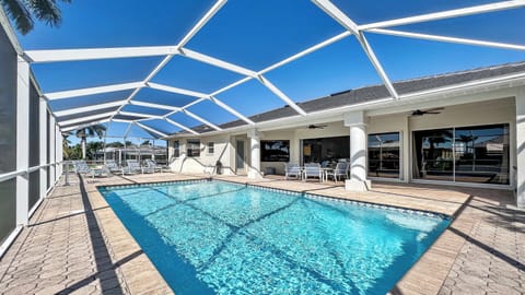 The pool area includes the covered lanai and a sundeck