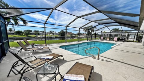 Terrace in southern exposure with pool and cozy sun lounger