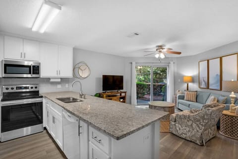 Kitchen/Living Area | Flat Screen TV | Stainless Steel Appliances | Queen Sleeper Sofa