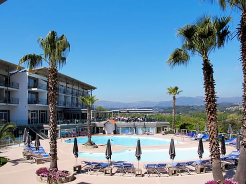Resort, Swimming Pool, Vacation, Property, Hotel, Resort Town, Building, Leisure, Palm Tree, Tree