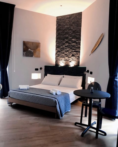 Design Room, 1 Bedroom, City View, Corner | In-room safe, soundproofing, iron/ironing board, free WiFi